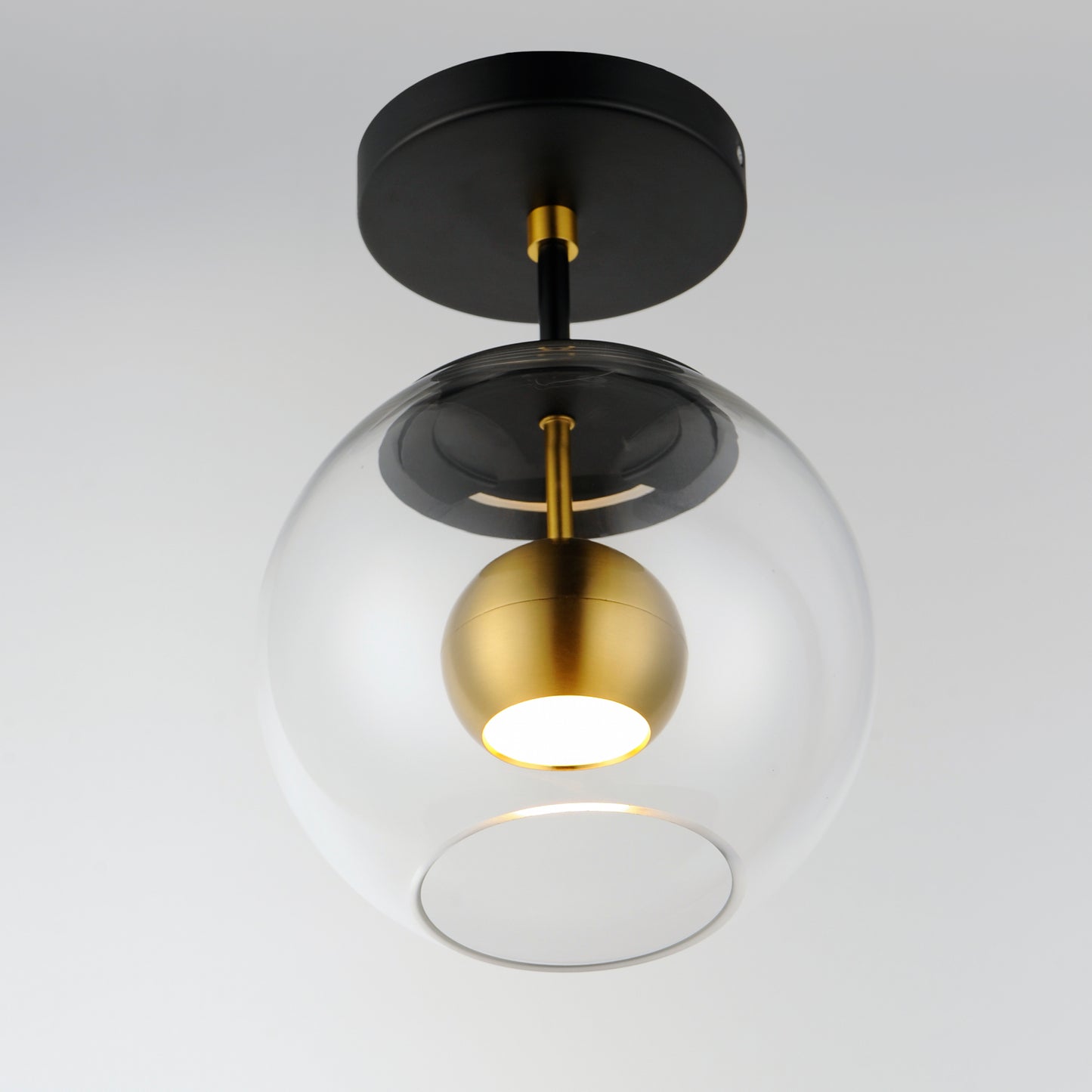 E25150-BKNAB - Nucleus 9" Flush Mount Ceiling Light - Black / Natural Aged Brass